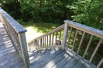 Deck Leading to Private Backyard with Firepit at Forest Ridge Vacation Home
